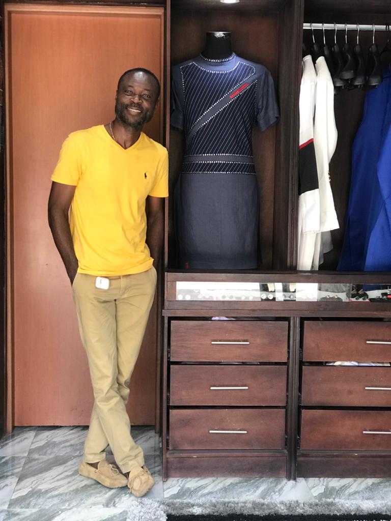 Kwesi at the Tailors